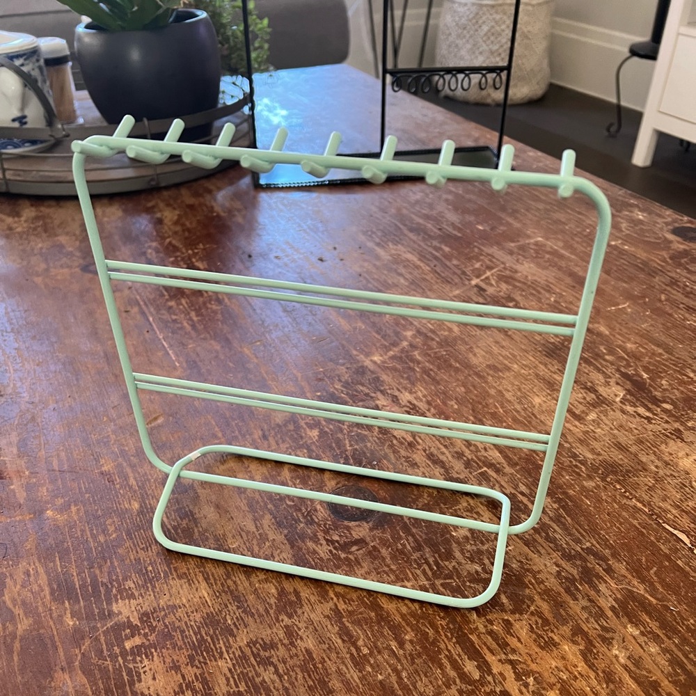 Jewelry organizer. Super cute and functional. Keeps your stuff organized.